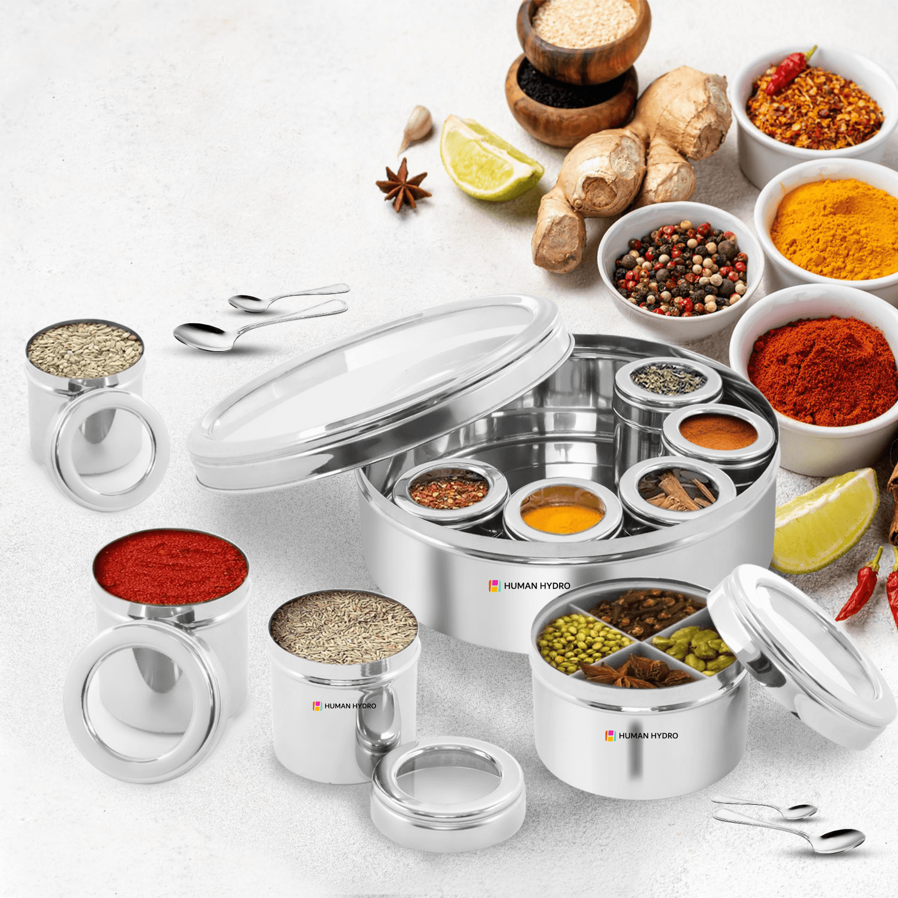 12-in-1 stainless steel masala dabba with see-through lid, spice containers, and assorted spices in a kitchen setting.