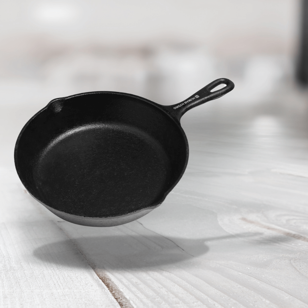 Human Hydro 8-inch cast iron fry pan, pre-seasoned, naturally nonstick, ideal for frying and searing.