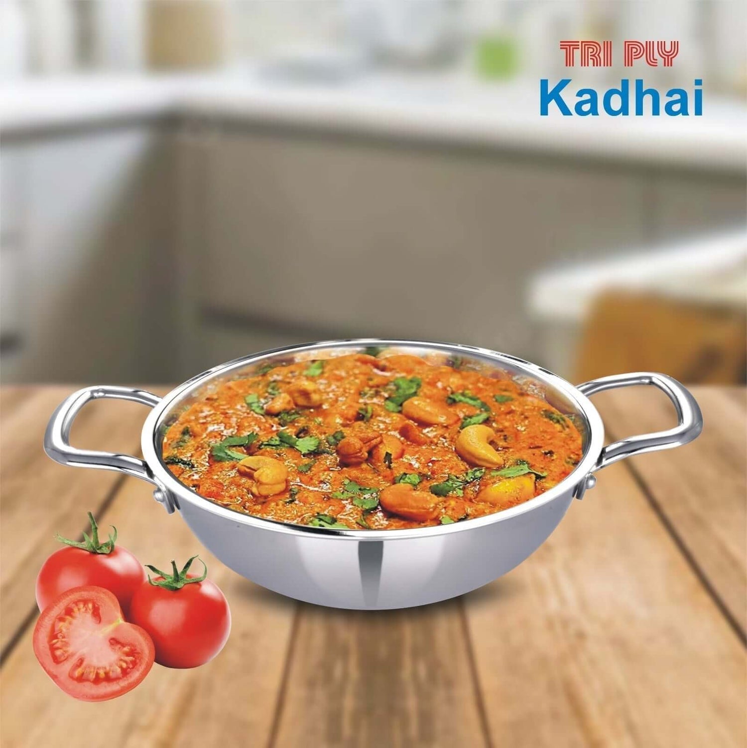 Veg Handi curry in a tri-ply stainless steel kadhai with fresh tomatoes on wooden surface.