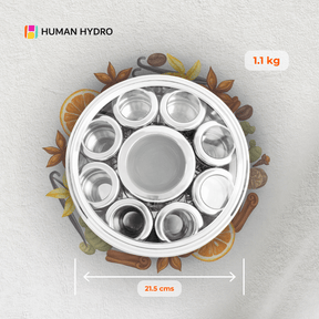 9-in-1 stainless steel masala dabba with see-through lid and mini containers for spice organization.