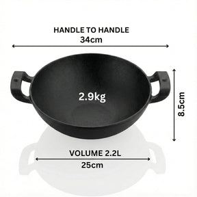 Black wok with measurements on a white background