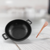 cast iron kadai with spatula