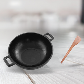 cast iron kadai with spatula