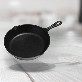 Human Hydro 8-inch cast iron fry pan, pre-seasoned, naturally nonstick, ideal for frying and searing.