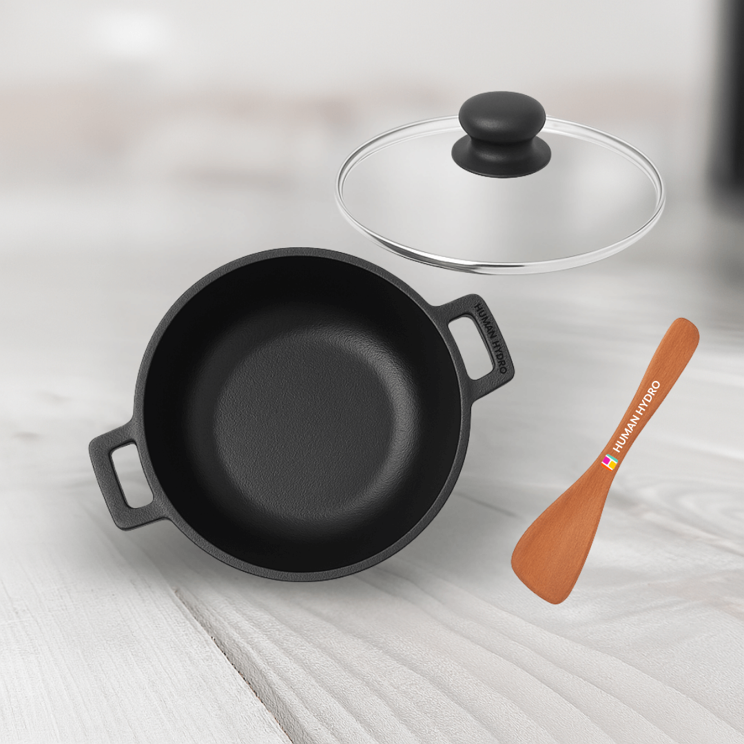 Himalayan Stone Kadai 23CM with lid and wooden spatula, iron-rich natural stone cookware for toxin-free cooking.